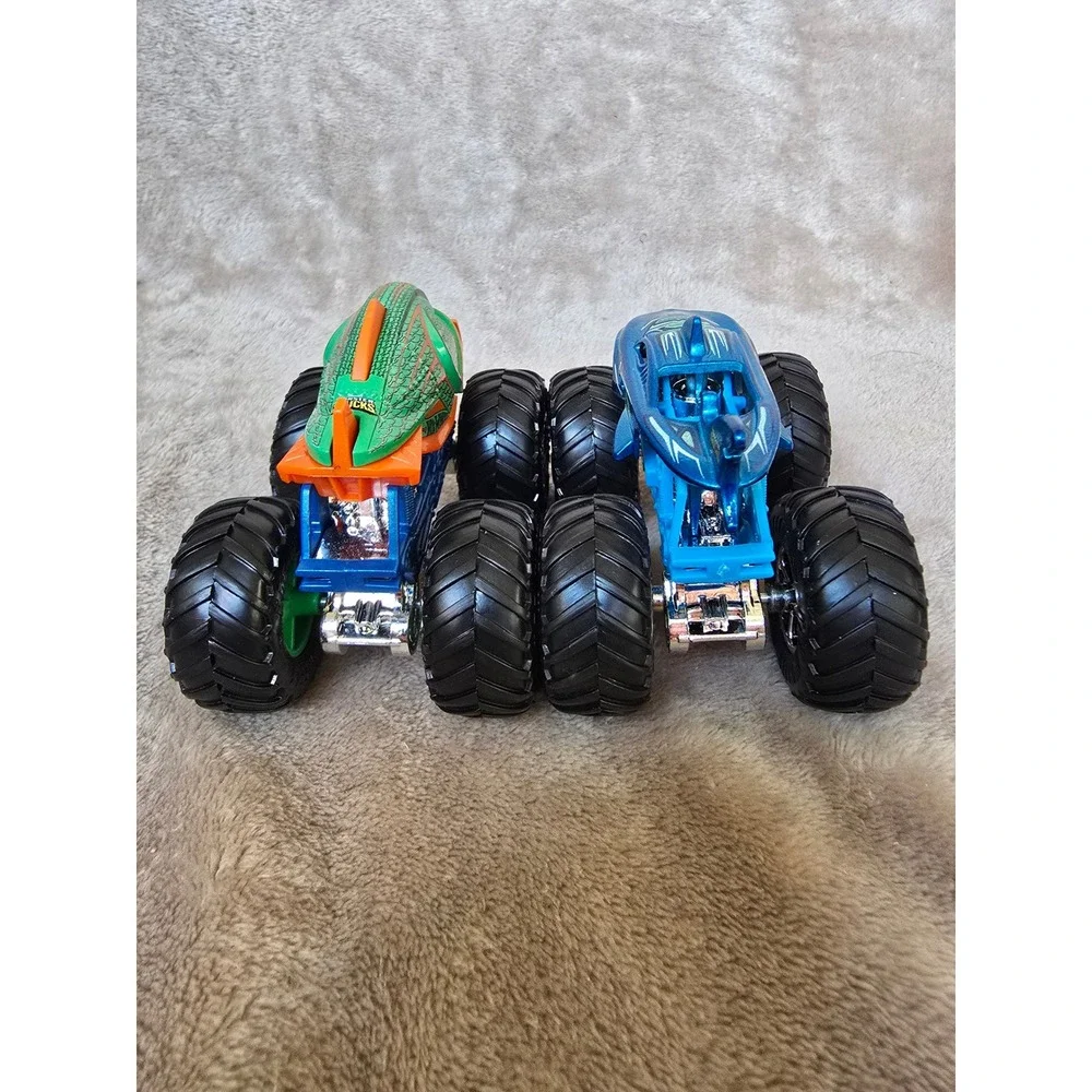 Hot Wheels Monster Trucks Shark Wreak and Piran-ahhh Blue Green Diecast Lot of 2